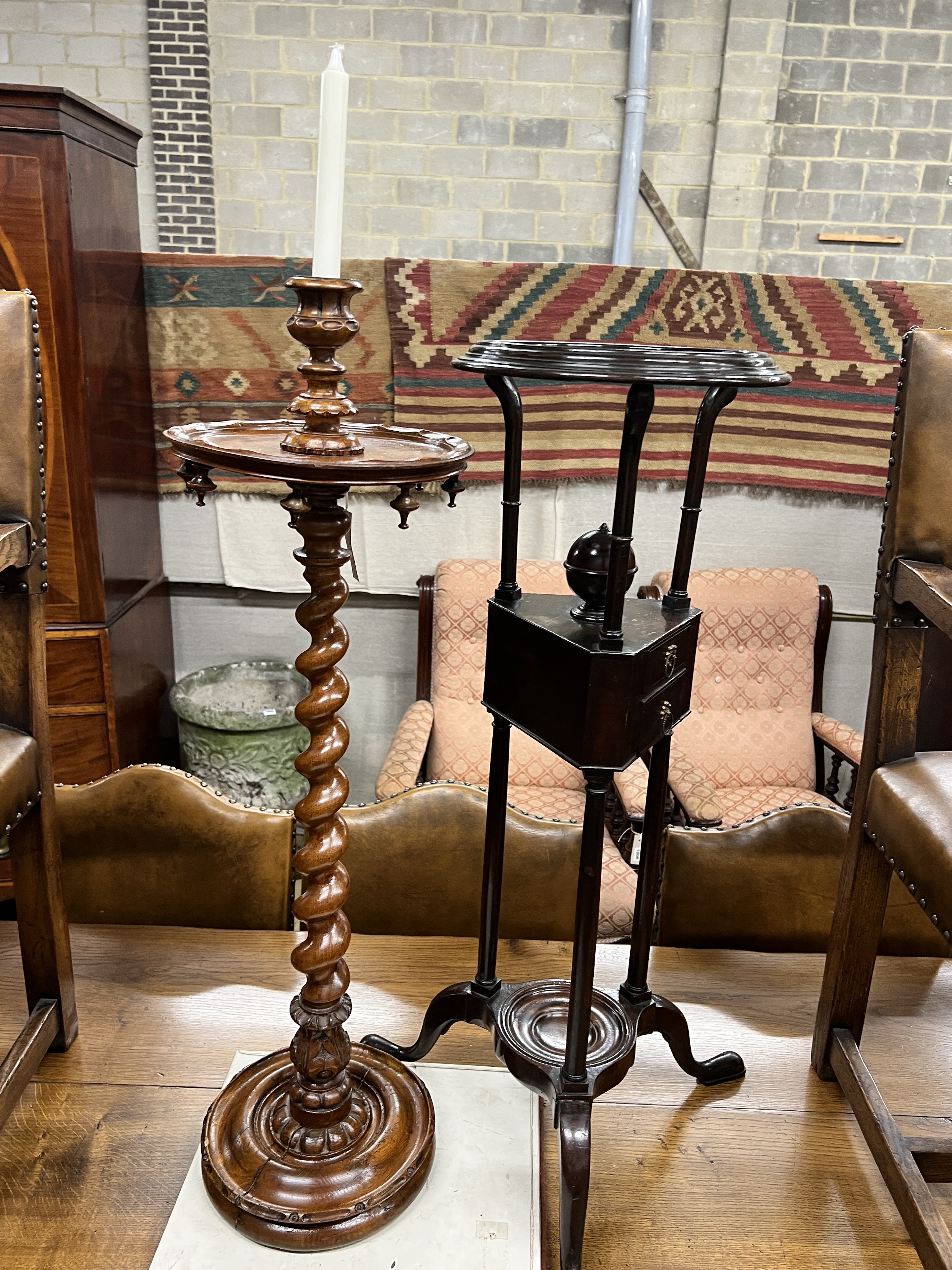 An early 20th century carved oak candle stand together with a mahogany washstand, larger height 91cm